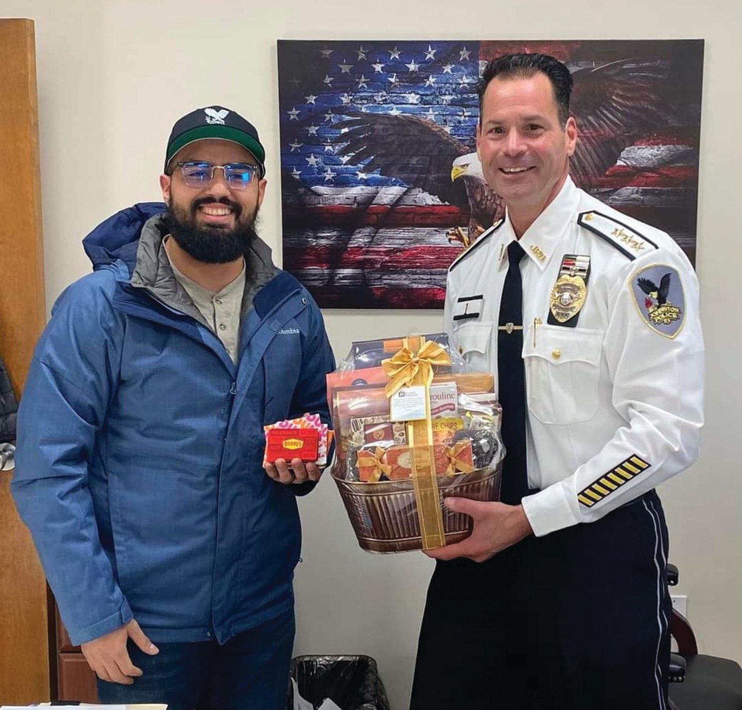 GIFT OF THANKS: The Johnston Police Department extends its “sincere thanks to Pastor Elton Perdomo and the entire congregation of the Greater RI Baptist Temple, who provided the station with a gift basket along with gift cards to local establishments for the entire department in celebration of Thanksgiving,” according to the department’s Facebook page.